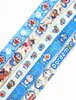 Fabrikspris 100 stycken Doraemon Anime Lanyard Nyckelring Halsrem Nyckel Kamera ID Telefonsträng Hänge Märke Fest Presenttillbehör Partihandel