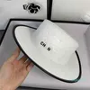 Sombreros de cubo de diseñador para mujer Sombrero de letras de color sólido Sombreros de paja tejidos a mano