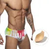 Costumi da bagno da uomo Slip da bagno da uomo Cuciture alla moda Colore Vita bassa Sexy Coulisse Tavola da surf Pad Push-up Nuoto Allenamento da immersioneUomo