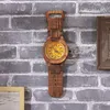 壁の時計シミュレートされた時計の北欧の家庭用木材創造的な性格サイレントベッドルームアート木製時計壁