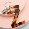 Porte-clés lettre de fête avec accessoires de pompon pour femmes cadeau porte-clés initial en or acétate imprimé léopard pendentif clés de voiture pendentifs