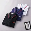 2022DESIGNER MENS BASIC BUSINESPOS POLOS TシャツファッションフランスブランドメンズTシャツ刺繍腕バンドレターバッジポロシャツショーツ