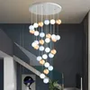 Lampes suspendues postmodernes rotatives en Duplex pour Grand escalier, luminaire de luxe pour Villa et appartement, boule de verre nordique Simple, longs lustres