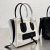 Klasyczna marka marki na płótnie torba zakupowa Kobietowa torebka o wysokiej pojemności mody luksusowy kolor stały kolor proste damskie torby na pojedynczy ramię