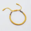 Очарование браслетов тибетские буддийские плетеное браслет-узел Удачный золотой веревку для мужчин.