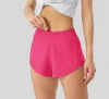 LU LU LEMONS Track -16 That Summer 2,5 polegadas Hotty Hot Shorts soltos respiráveis de secagem rápida Calças esportivas femininas de ioga saia versátil casual bolso lateral G