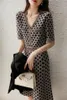 Yeni Kadınlar V yaka Kısa Kollu Geometrik Baskı Örme Yüksek Bel A-line kazak elbisesi artı boyutu SMLXLXXL