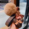 Mouse Design Car Keychain Favor Flower Bag Pendant Charm Jewelry Keyring Holder for Men Gift Fashion PU Leather Animal Key Chain Accessories pom pom