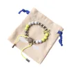 Monogram perle gialle bracciale m00510 fili di design