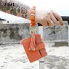 Wholesale Bracelet Keychain Silicone Bead PU Bracelet Card Wallet Holder Tassel Keyring