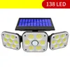 Party Supplies New solar wall light LED three-head rotatable outdoor waterproof human body induction garden street light
