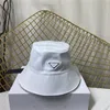 Zakłony kulkowe projektant odwrócony trójkąt wiadra czapki para letnie paski mężczyźni kobiety Sunshade Hip Hop Fisherman Hat z tagami TQJL6315379