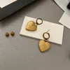 Le donne antiche degli orecchini della lettera di amore incantano le viti prigioniere dell'orecchio d'ottone del pendente a forma di cuore Eardrops Designer Ladies Dangler Commercio all'ingrosso