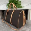 men women high-quality travel duffle bags brand designer luggage handbags With lock large capacity sport bag Purse Crossbody bag