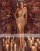 Sexy glänzende goldene Pailletten-Feder-Meerjungfrau-Abschlussballkleider bodenlangen vorderen geteilten formellen Kleid-Abend-Partei-Kleider nach Maß Vestidos De Fiesta