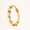 Pulseiras de estilo clássico femininas pulseira de luxo designer de joias de cristal banhado a ouro 18 quilates de aço inoxidável para amantes pulseira de presente masculina ZG1161