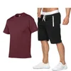 Herrspårspår mode tryckt t-shirt sportdräkt snabbtorkande avslappnad löpning slitage sommaren kortärmade shorts 2-stycken setmen's