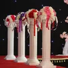 2pcs / lot mode bröllop rekvisita dekorativa konstgjorda ihåliga romersk kolonner vit färg plast pelare väg citerade fest händelse diy