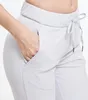 Femmes Tissus extensibles Loose Fit Sport Active skinny Leggings avec deux poches latérales camo Cheville-Longueur Pantalon 220325