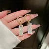 Luxury Luxury Square Crystal Drop Penrings for Women Brilliant Gold Color Joya de boda nupcial Pendientes colgantes GC1156