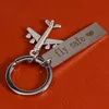 Keychains Diy roestvrij staal sleutelhanger veilig paar cadeau vliegtuig sleutelhanger tas accessoires autoring hanger Travel Keyring diykeychains keyc