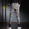 Pantaloni casual da uomo Streetwear coreano Pantaloni slim fit elasticizzati neri 220330