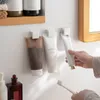 Clip per detergente viso montato a parete Porta dentifricio autoadesivo Porta latte per il viso Clip per supporto da bagno
