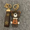 Designer Animal Key Chain Brown Flower Monkey Tiger Lion Bear Keychains Accessories Pu Leather Car Keys Holder Gold Metal Cartoon 6380125