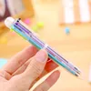 Creatieve multicolor balpoint pennen transparant plastic 6-kleuren automatische pen schattige cartoon schoolbenodigdheden
