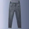 Autumn Men's Winter Tjocka jeans Herrmodemärke ungdomar Elastiska smala raka byxor