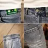 Jeans da uomo personalità maschile margherita ricamata denim stampato pantaloni slim coreani da uomo alla moda 2022 estate ritagliata matita per adolescenti