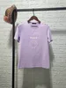 23色の女性Tシャツファッショントップマンコインレタープリントボタンアップレディンティーホワイトコットン夏の夏通りのストリートウェアTシャツブラックヒップホップカジュアルXKU