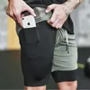 Tremol de cor de cor sólida de camada dupla, treinamento de fitness de tamanho grande masculino calça de corrida de seca rápida shorts esportivos