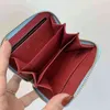 Diseñador de canal de cuero bolso pequeño bolso billetera Europa y América Moda para mujer para hombre Zero Wallet Nueva moneda versátil simple Min277u
