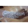 Fashion Short Fingerless Bridal Gloves White Lace Appliques Beaded Ribbon Tied Brides Accessories Wrist Length Wedding Gloves AL2508