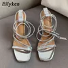 Nxy sandalen nieuwe straatstijl steentjes hoge hakken enkelband strappy voor vrouwen mode feest bruids schoenen zilveren pompen