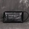 Sac cosmétique d'affaires en cuir pour hommes grande capacité sac de rangement en relief à la mode simple