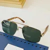 Klassiska mäns kvinnors solglasögon 0529S Designer Oval Frame Metal Stripe Temples Fashion Brand Beach Travel Glasses
