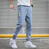 Calça de jeans masculina de jeans hiqor calça de cargo de jeans de streetwear calça de algodão Hip Hop Male azul de tamanho grande 5xl 4xl 220504