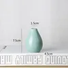 Vase en céramique artisanat moderne décoration de bureau à domicile ornement céramique émaillée Vases à fleurs sèches parfum en céramique petite bouteille
