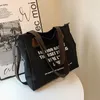 HBP Retro large capacity canvas bags female casual college wind Messenger college student hand Tote bag