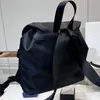 2023 Designer de mode unisexe luxe noir sacs à dos sacs d'école taille moyenne nylon étudiants sac extérieur voyage sacs à bandoulière sac à dos pour haut