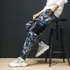 Pantaloni da uomo Moda Streetwear Camouflage Jogger Uomo Loose Fit Fasciato alla caviglia Stile Punk Hip Hop Multi tasca Cargo militare