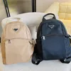 Kadın moda sırt çantaları tasarımcı çantalar şık katı sırt çantası tuval okul çantası yüksek kapasiteli çapraz vücut çantası 5a-yüksek kalite2503