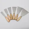 En gros en acier inoxydable deux couleurs poignée mastic lot couteau manche en bois double clip miroir poli spatule