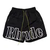 RHUDE Pantaloncini da uomo Summer High Street Stampa alfabetica con coulisse Pantaloni hip-hop riflettenti Pantaloni casual da spiaggia Pantaloncini a cinque punti Trendy Men 234