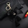 Keychains Number 5 Camellia Bag Pendant For Woman Luxury Jewelry Bow Car Keyring Bowknot Pearl DecorationKeychains Emel22