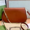 Designer Blondie Bolsas de ombro m￩dio bege lona branca de couro transversal corpora de hardware em tons dourados bolsa de bolsa de luxo