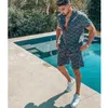 Moda Tuta Uomo Set hawaiano T-shirt Stampa Estate Camicia a maniche corte con bottoni Pantaloncini da spiaggia Streetwear Casual Abito da uomo 2 pezzi S-3xl