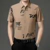 Chemises décontractées pour hommes Anti-rides Lavage et usure Lettres Imprimer Manches courtes Hommes Chemise Été Qualité Coton Lin Respirant Chemise HommeMen